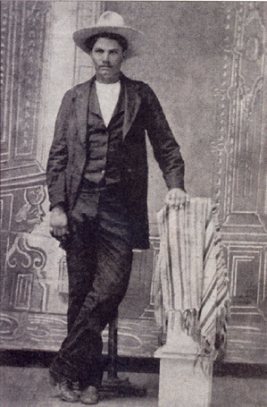 This ferrotype photograph is a mirror image of Hardin., Public domain image – Wikimedia Commons